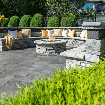 Unilock Umbriano Patio and Rivercrest Fire Pit and Seat Wall