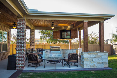 Uniquely Beautiful Covered Patio with a Fire Table