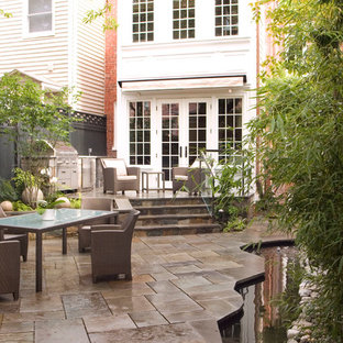 Inspiration for a timeless patio fountain remodel in DC Metro