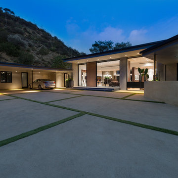 Wallace Ridge Beverly Hills modern luxury home landscaped driveway & glass wall