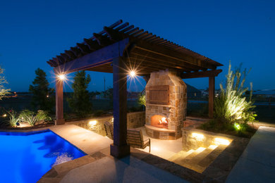 Patio photo in Dallas with a fire pit, decking and a pergola