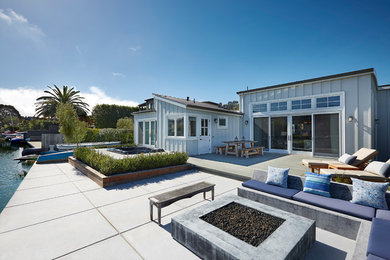 Design ideas for a nautical back patio in San Francisco with brick paving.