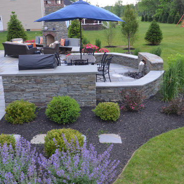 Water feature and outdoor fireplace - no need to live inside!