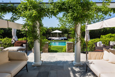This is an example of a coastal patio in New York.