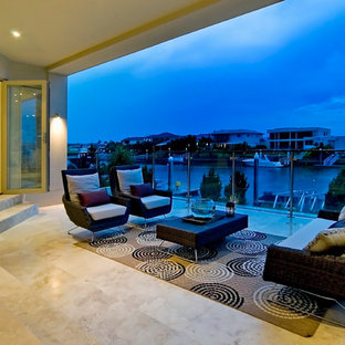 Foto di un grande patio o portico etnico dietro casa