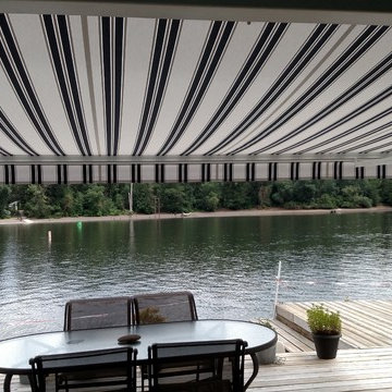 Waterside patio retractable awning