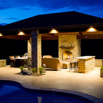 Well- Lit Poolside Pavilion by Red Valley Landscape & Construction