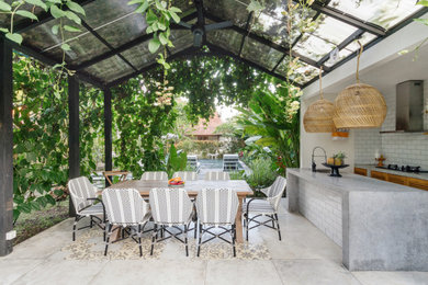 Inspiration for a contemporary patio kitchen remodel in Los Angeles with a gazebo