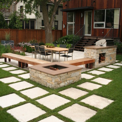 Trendy patio photo in Chicago with a fire pit