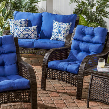 Wicker Woven Lounge Set with Pattern Accent Pillows and Bold Blue Cushions