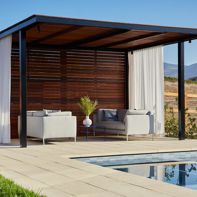 Trendy backyard patio photo in San Francisco with a gazebo
