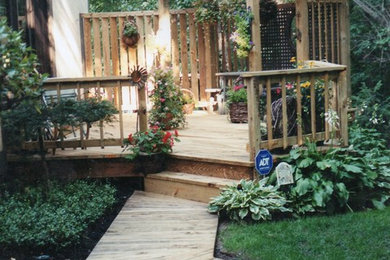 Wood walkway, patio, and pergola