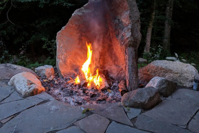 Example of a mountain style patio design in Providence