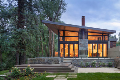 Inspiration for a contemporary patio in Denver with a fire feature and no cover.