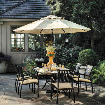Wrought aluminum patio dining set and outdoor umbrella