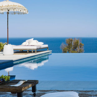 Foto de piscina infinita, marinera, rectangular