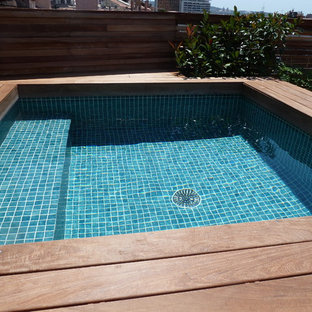 Idee per una piccola piscina fuori terra minimal personalizzata sul tetto con pedane