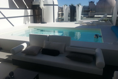 Modelo de casa de la piscina y piscina elevada minimalista de tamaño medio a medida en azotea