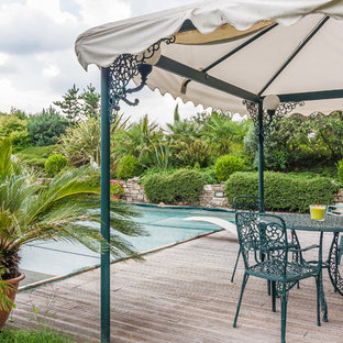 Idee per una piscina mediterranea dietro casa con pedane
