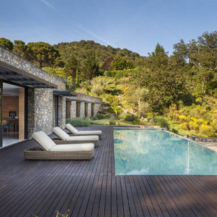Idee per una piscina minimal rettangolare con una dépendance a bordo piscina