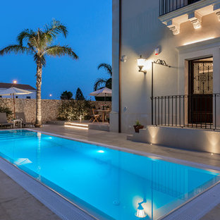 Idee per una piscina monocorsia stile marinaro rettangolare dietro casa
