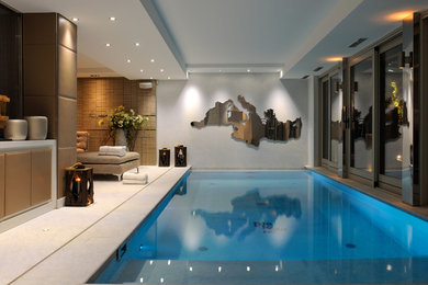 Idée de décoration pour une grande piscine chalet rectangle.