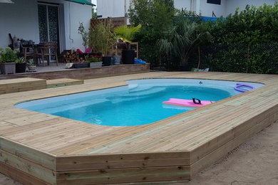 Idée de décoration pour une piscine champêtre.