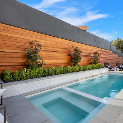 Pool fountain - contemporary rectangular pool fountain idea in Los Angeles
