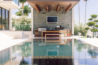 Inspiration for a contemporary rectangular pool remodel in Miami