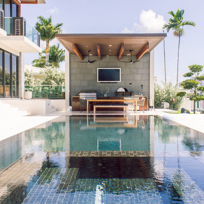 Inspiration for a contemporary rectangular pool remodel in Miami