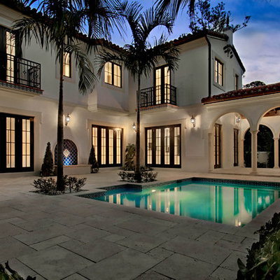 Inspiration for a mediterranean rectangular pool remodel in Miami