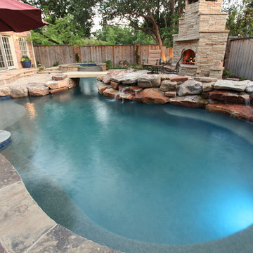 A Cocktail Pool and Spa with a Fitness Area in South Tulsa
