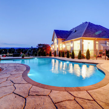 A Pool with a Countryside View
