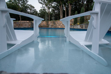 Example of a large transitional backyard rectangular hot tub design in Oklahoma City