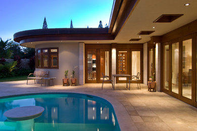Pool fountain - mid-sized contemporary courtyard stone and custom-shaped pool fountain idea in Hawaii