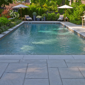 Backyard Pool Patio with Concrete Slabs