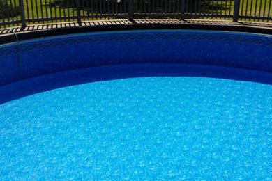 Pool - large backyard pool idea in Milwaukee