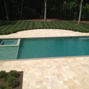 After: Installation of Gunite pool & spa, travertine pool deck and landscape