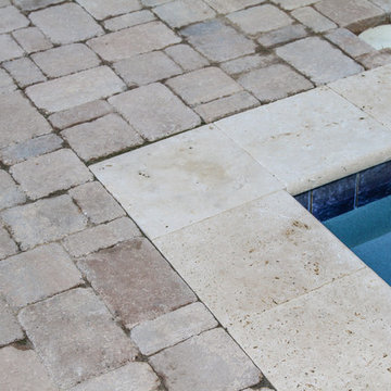 AFTER WITH PAVERS PUT IN:  Pool with firepit, english garden, large patio areas