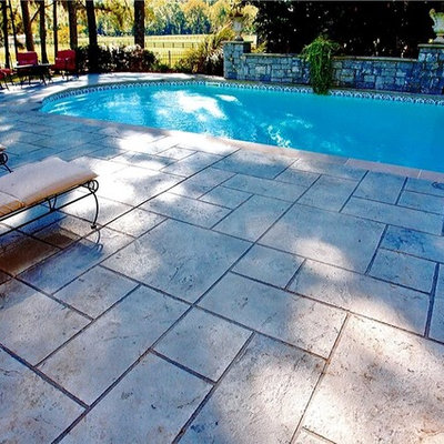 Pool - mid-sized mediterranean courtyard custom-shaped aboveground pool idea in Other with decking