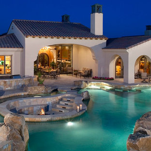 Inspiration for a mediterranean custom-shaped pool remodel in Orange County