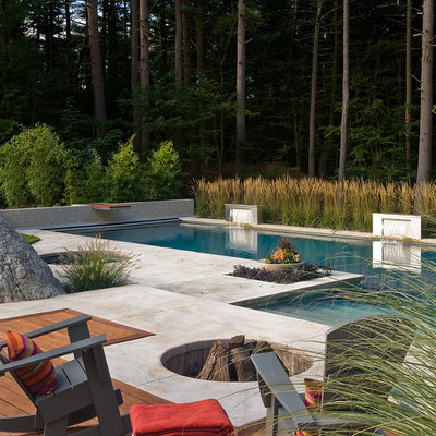 Hot tub - large contemporary backyard concrete and rectangular lap hot tub idea in Boston