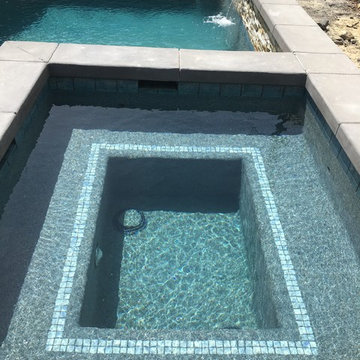Andrews new pool & spa job. Glass tile on spa bench.