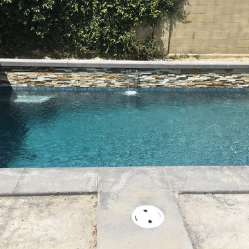 Andrews new pool & spa job. Sheer decsents water features.