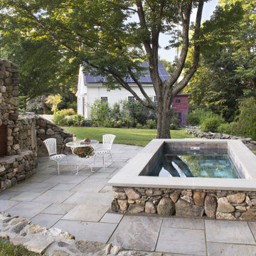 Antique Farmhouse Outdoor Living Space with plunge pool