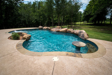 Inspiration for a tropical pool remodel in Dallas