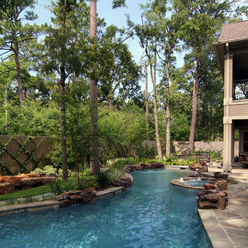 Artfully landscaped space with pool
