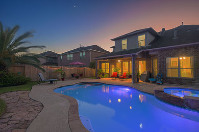 Design ideas for a contemporary swimming pool in Houston.