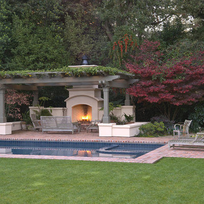 Pool - mid-sized traditional backyard brick and rectangular lap pool idea in San Francisco