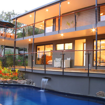 Back Exterior.  Modern Tropical home.  Pool.  Patio.